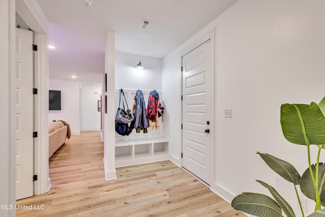 hallway featuring light wood-type flooring