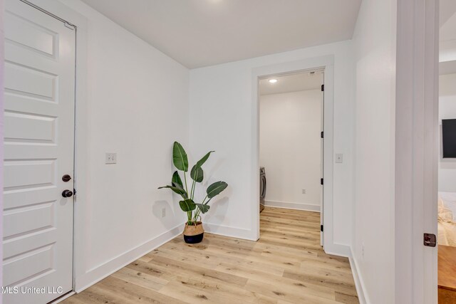 entryway with light hardwood / wood-style flooring