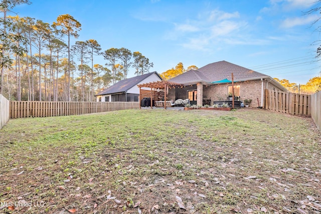 view of yard featuring a pergola and a patio