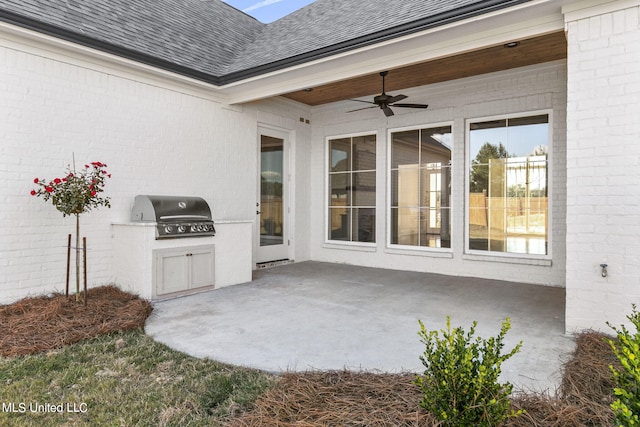 view of patio / terrace featuring ceiling fan and a grill