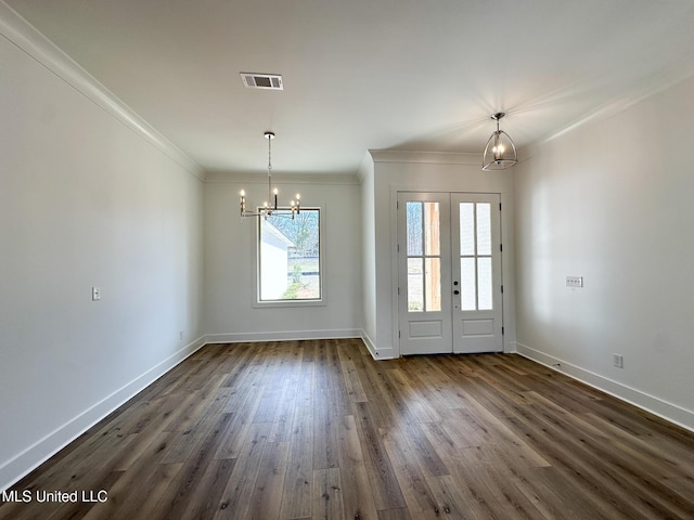 unfurnished dining area with baseboards, visible vents, dark wood-style floors, french doors, and a notable chandelier