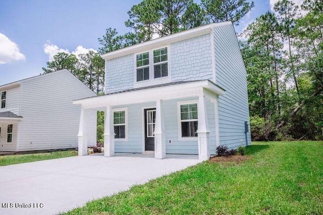 view of front of home featuring a front lawn