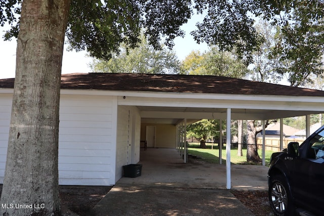 view of parking featuring a carport