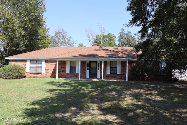 ranch-style home featuring a front yard