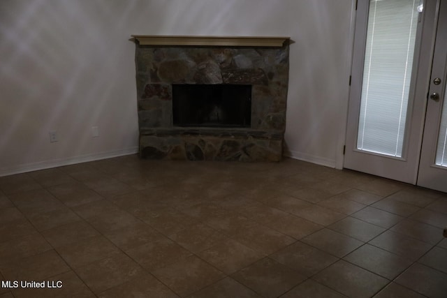 unfurnished living room featuring a fireplace