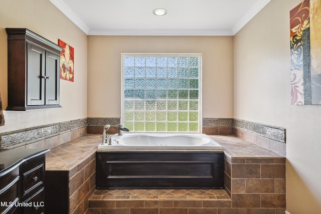 bathroom featuring crown molding and tiled bath