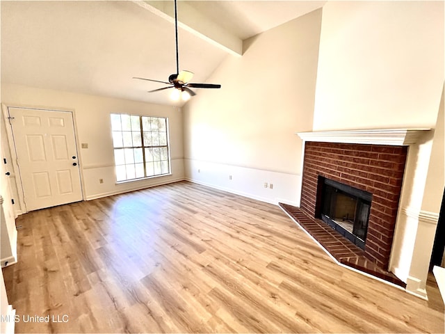 7164 Kimlee Cv, Southaven, MS 38671 - unfurnished living room featuring a ceiling fan, a fireplace, wood finished floors, and baseboards