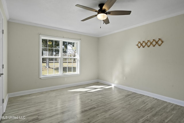 empty room featuring ornamental molding, ceiling fan, and light hardwood / wood-style flooring