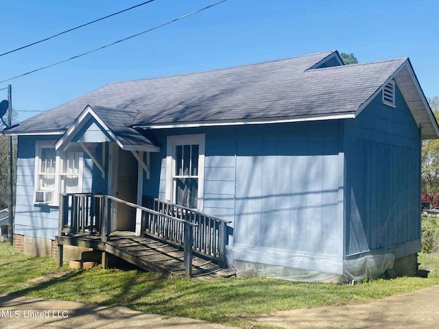 view of front of property with cooling unit