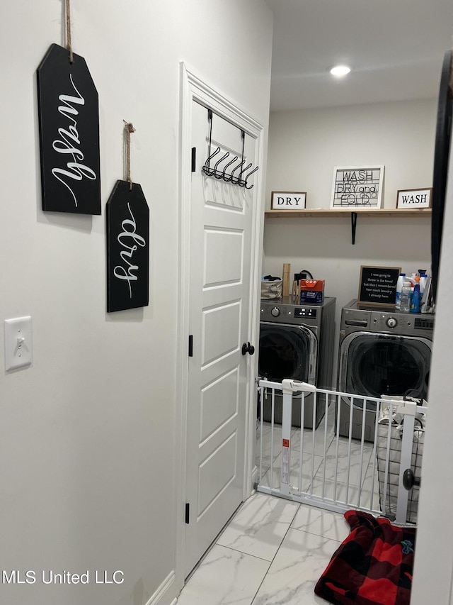 laundry area with laundry area, recessed lighting, marble finish floor, and independent washer and dryer