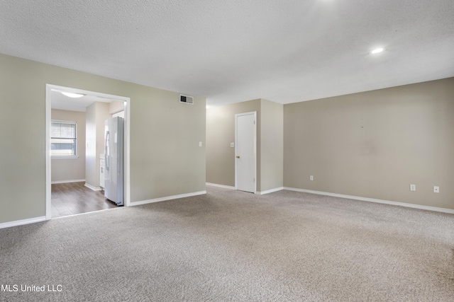295 Highpoint Dr, Diamondhead, MS 39525 - spare room featuring baseboards, visible vents, and carpet floors