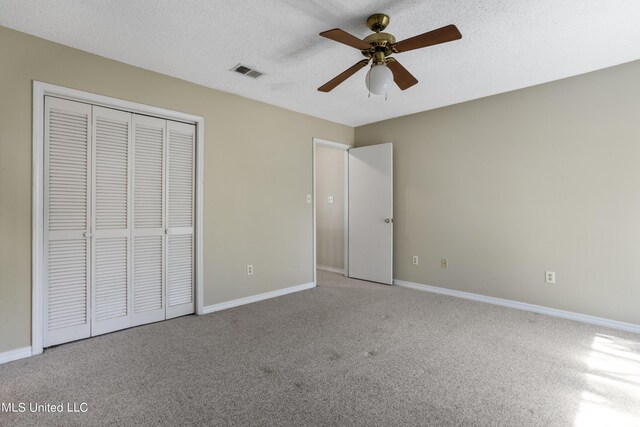295 Highpoint Dr, Diamondhead, MS 39525 - unfurnished bedroom featuring carpet, visible vents, baseboards, and a closet