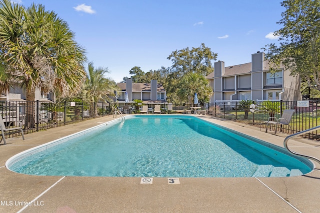 view of pool with a patio area