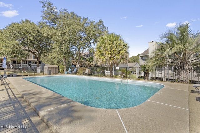 295 Highpoint Dr, Diamondhead, MS 39525 - pool with a patio and fence
