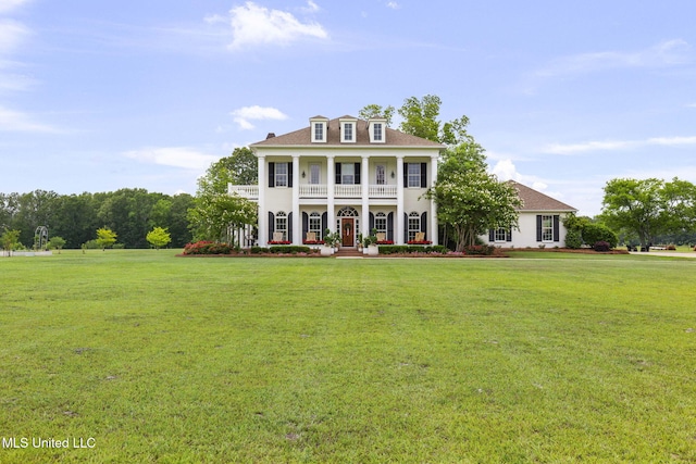 1053 Woodbridge Dr, Brandon, MS 39047 - neoclassical / greek revival house with a balcony, a porch, and a front lawn