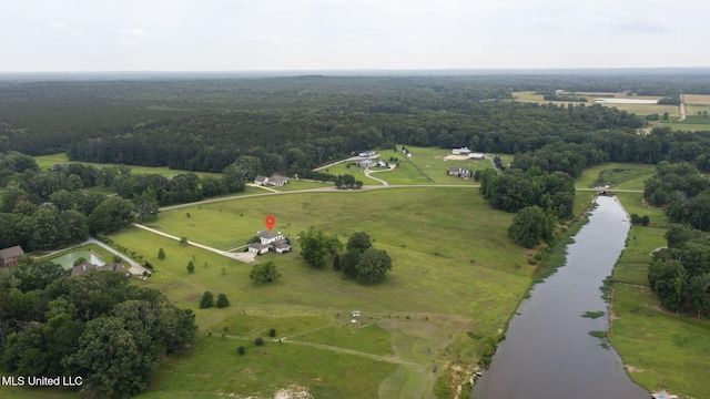 1053 Woodbridge Dr, Brandon, MS 39047 - aerial view of property and surrounding area with a nearby body of water, rural landscape, and a heavily wooded area
