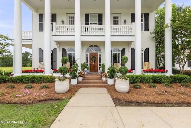 1053 Woodbridge Dr, Brandon, MS 39047 - view of front of home featuring a balcony and covered porch