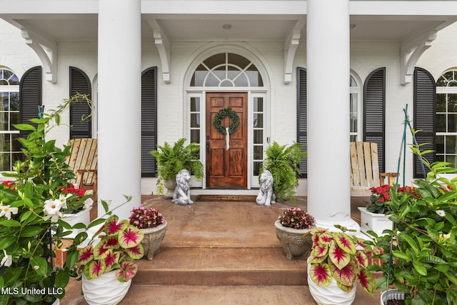 1053 Woodbridge Dr, Brandon, MS 39047 - property entrance with covered porch and brick siding