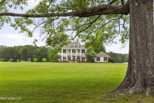 1053 Woodbridge Dr, Brandon, MS 39047 - view of green lawn featuring covered porch