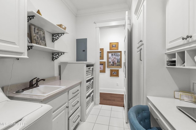 1053 Woodbridge Dr, Brandon, MS 39047 - laundry area featuring electric panel, cabinet space, washer / clothes dryer, light tile patterned floors, and crown molding