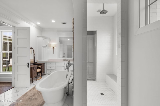 1053 Woodbridge Dr, Brandon, MS 39047 - full bathroom with vanity, a freestanding bath, tile patterned flooring, a tile shower, and ornamental molding
