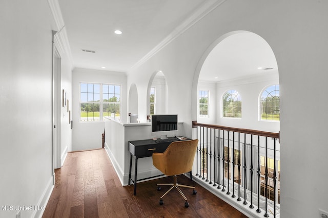1053 Woodbridge Dr, Brandon, MS 39047 - home office with wood finished floors, recessed lighting, baseboards, crown molding, and arched walkways