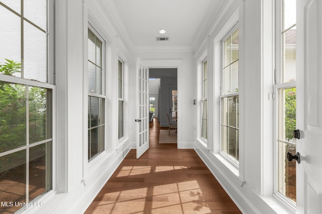 1053 Woodbridge Dr, Brandon, MS 39047 - unfurnished sunroom with plenty of natural light, french doors, crown molding, wood finished floors, and baseboards