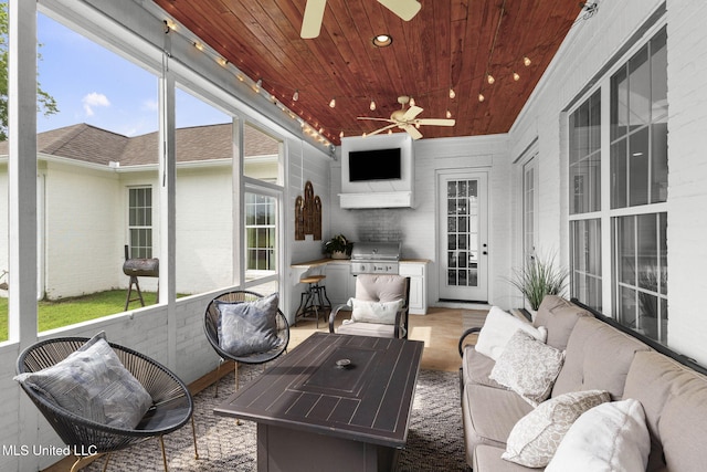 1053 Woodbridge Dr, Brandon, MS 39047 - sunroom featuring a ceiling fan, an outdoor hangout area, and an outdoor kitchen