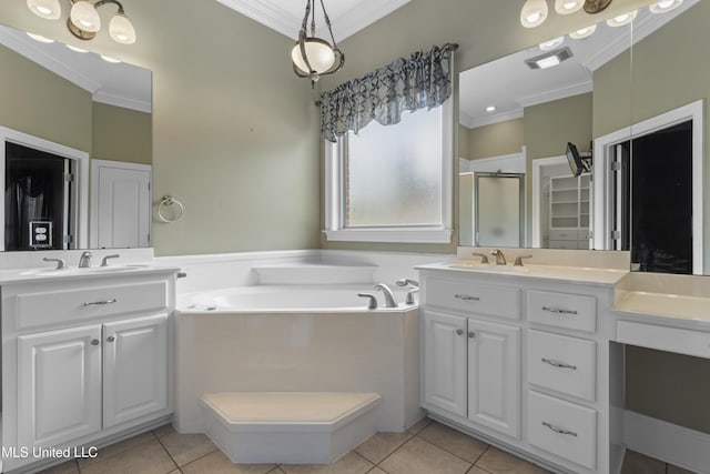 5578 E Diamondhead Dr, Diamondhead, MS 39525 - bathroom with crown molding, a shower stall, tile patterned flooring, two vanities, and a garden tub