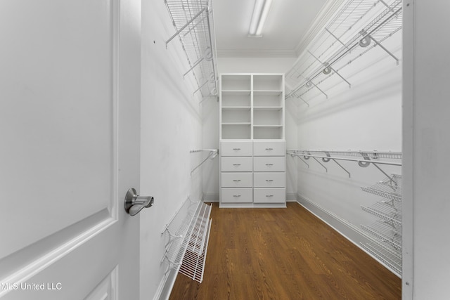 5578 E Diamondhead Dr, Diamondhead, MS 39525 - spacious closet with dark wood finished floors