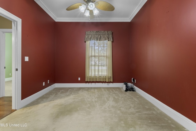 5578 E Diamondhead Dr, Diamondhead, MS 39525 - spare room featuring a ceiling fan, crown molding, carpet, and baseboards