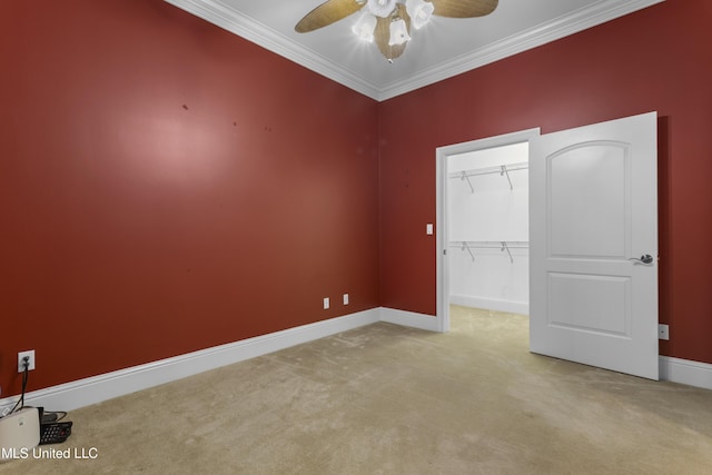 5578 E Diamondhead Dr, Diamondhead, MS 39525 - spare room featuring carpet, crown molding, baseboards, and ceiling fan