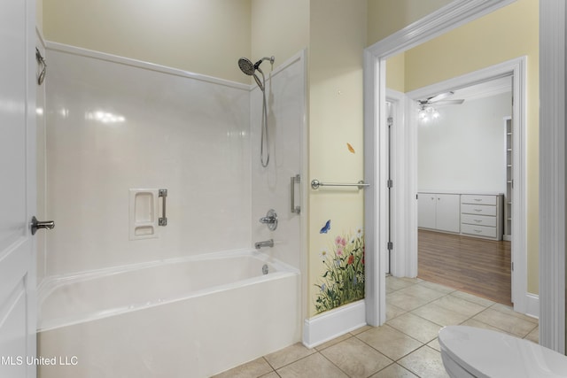 5578 E Diamondhead Dr, Diamondhead, MS 39525 - full bath featuring bathing tub / shower combination, tile patterned floors, toilet, and ceiling fan