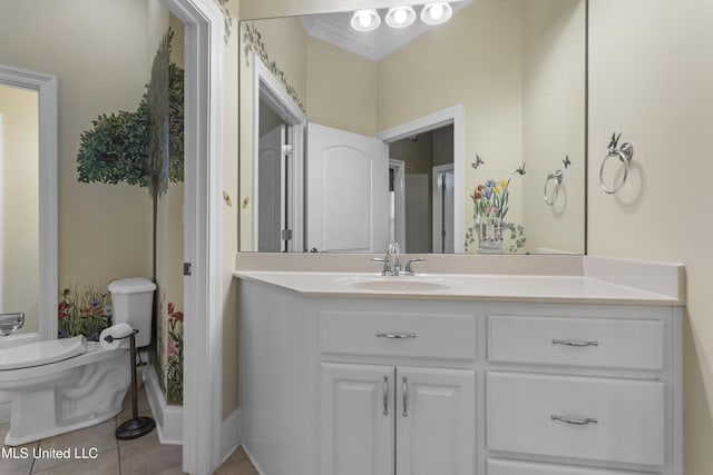 5578 E Diamondhead Dr, Diamondhead, MS 39525 - bathroom featuring vanity, toilet, tile patterned flooring, and crown molding