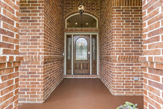 5578 E Diamondhead Dr, Diamondhead, MS 39525 - property entrance with brick siding