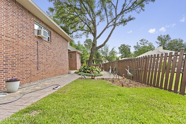 5578 E Diamondhead Dr, Diamondhead, MS 39525 - view of yard featuring a patio area
