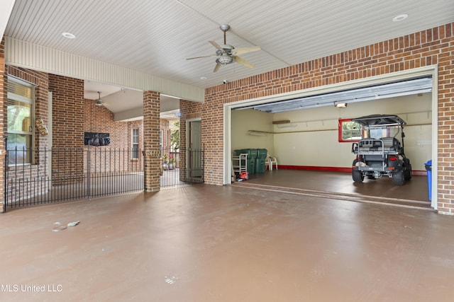 5578 E Diamondhead Dr, Diamondhead, MS 39525 - garage with a ceiling fan