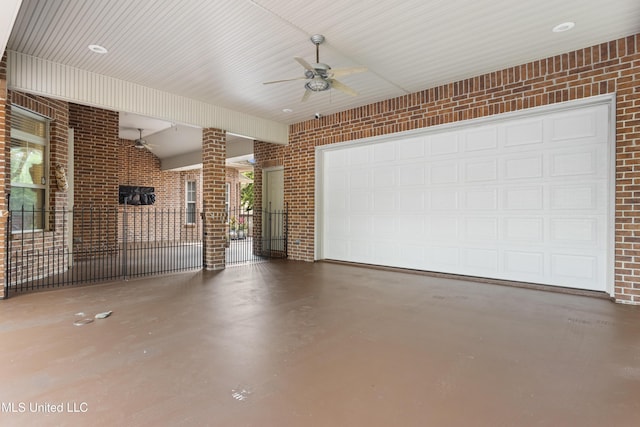 5578 E Diamondhead Dr, Diamondhead, MS 39525 - garage featuring a ceiling fan