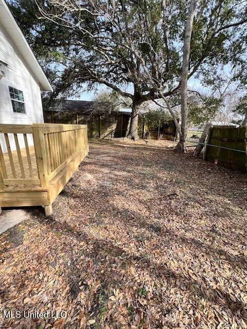 view of yard featuring a deck