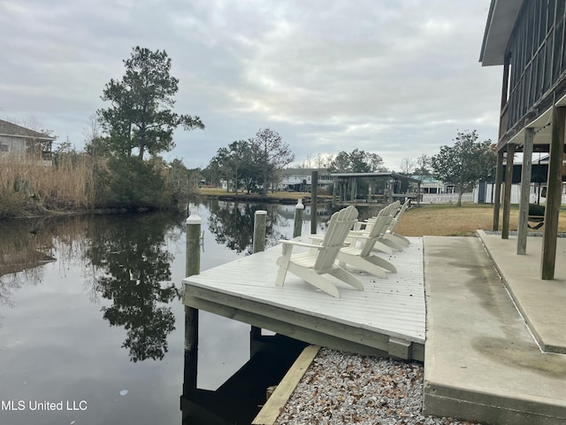 view of dock with a water view