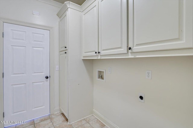 107 Bridgeton Ct, Canton, MS 39046 - clothes washing area featuring electric dryer hookup, hookup for a washing machine, cabinet space, baseboards, and light tile patterned floors