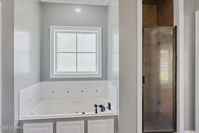 107 Bridgeton Ct, Canton, MS 39046 - bathroom with a shower stall and a jetted tub