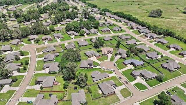 107 Bridgeton Ct, Canton, MS 39046 - aerial view of property and surrounding area with nearby suburban area