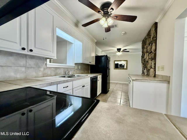 kitchen with a ceiling fan, ornamental molding, decorative backsplash, black appliances, and white cabinets