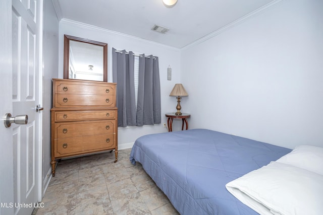 bedroom featuring crown molding