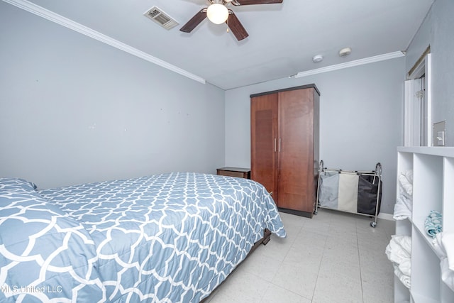 bedroom with ceiling fan, a closet, and ornamental molding