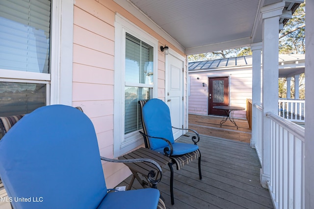 wooden deck featuring a porch