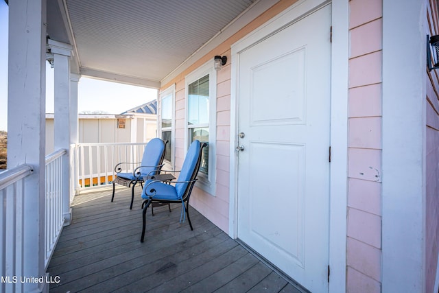 balcony featuring covered porch