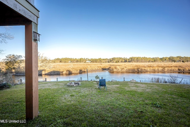 view of yard with a water view