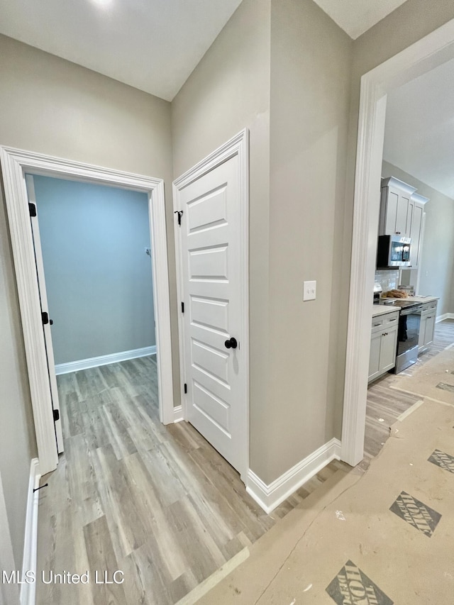 hall featuring light hardwood / wood-style floors